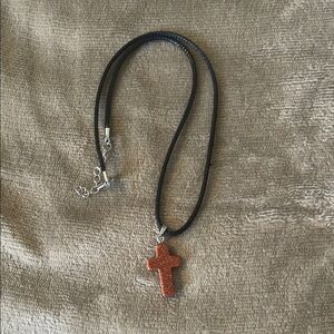 Black Necklace with Glittery Orange Cross Pendant